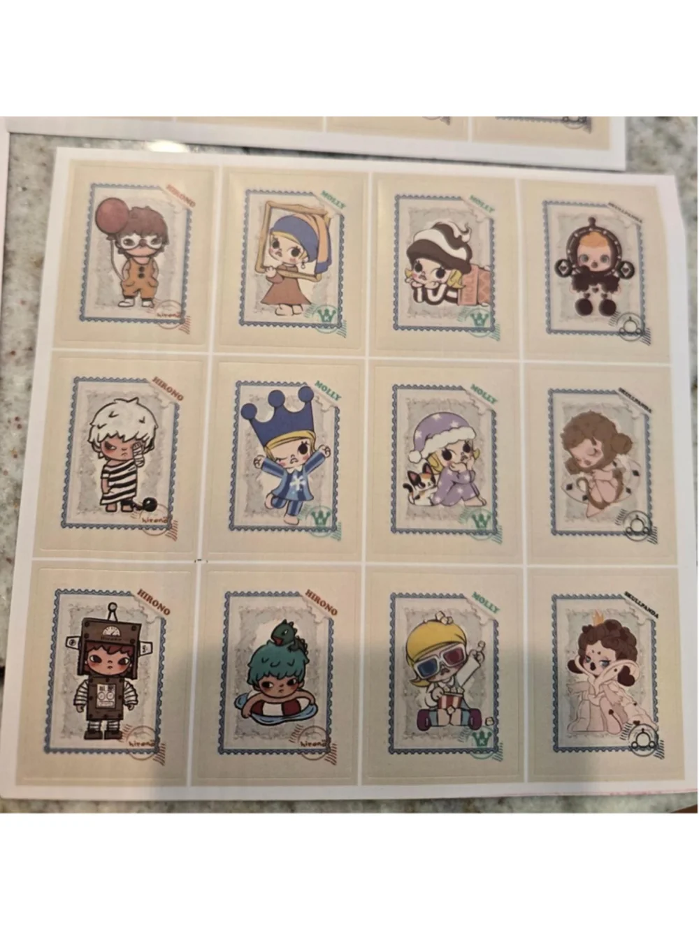 6 sticker sheets that are size 5 in by 5 in - pop mart characters